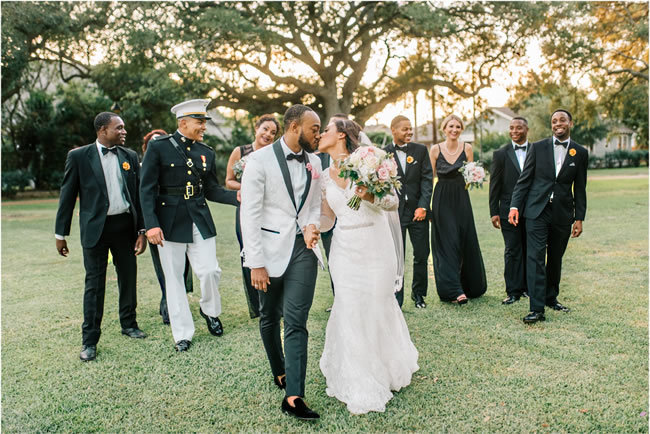 Newlyweds and their bridal party celebrate their new marriage