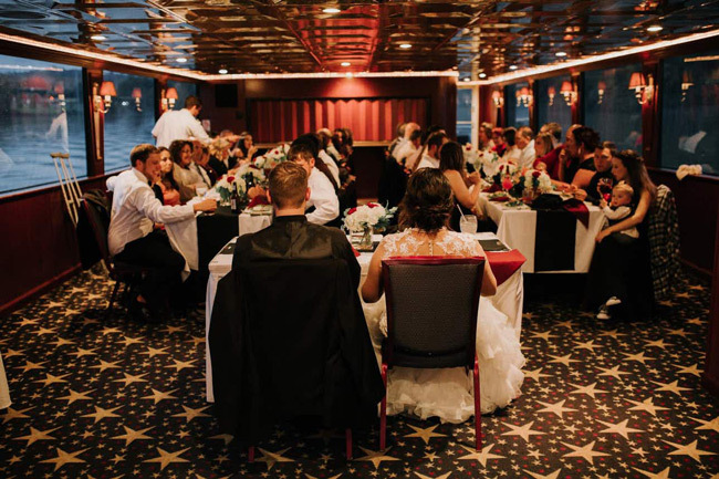 Boat Wedding Ideas and Tips | Indoor wedding reception on a yacht