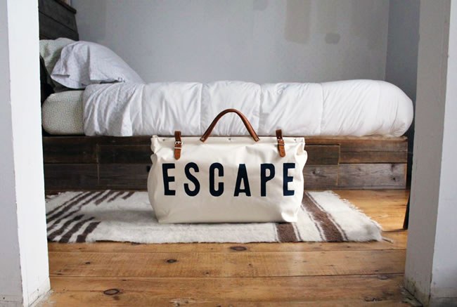 An ESCAPE Canvas Utility Bag by Forest Bound, packed and ready to go