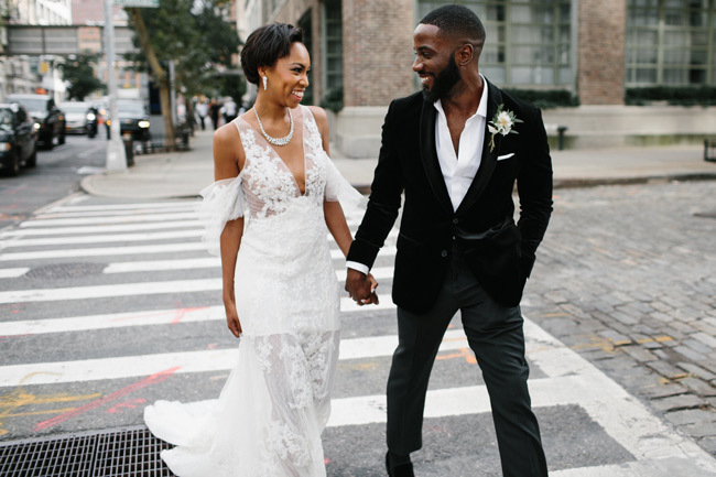 Stylish bride and groom crossing a city street | Elopement Checklist