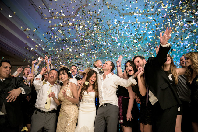 Confetti rains down on wedding reception | Best wedding photography tips