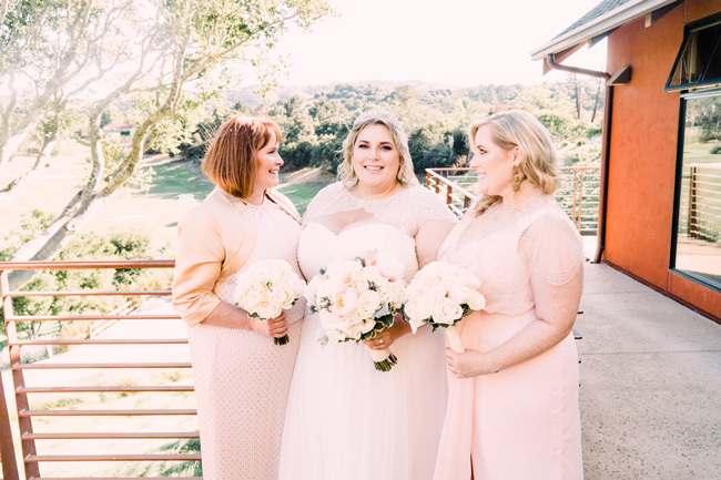 A blushing bride with her mom and MOH | How To Tip Your Wedding Vendors