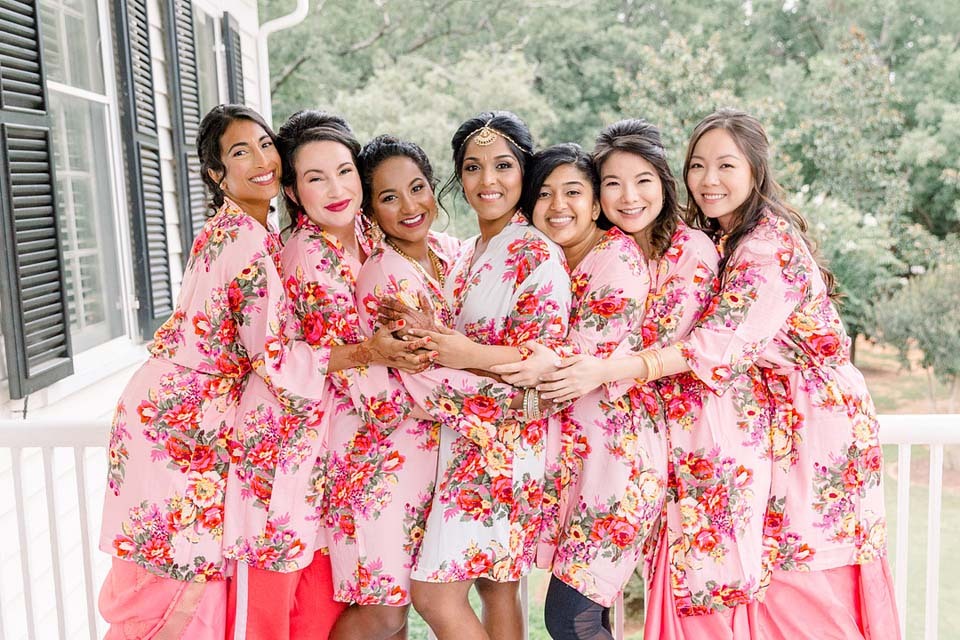 How To Spend Your Wedding Budget | Bridesmaids in floral getting-ready robes