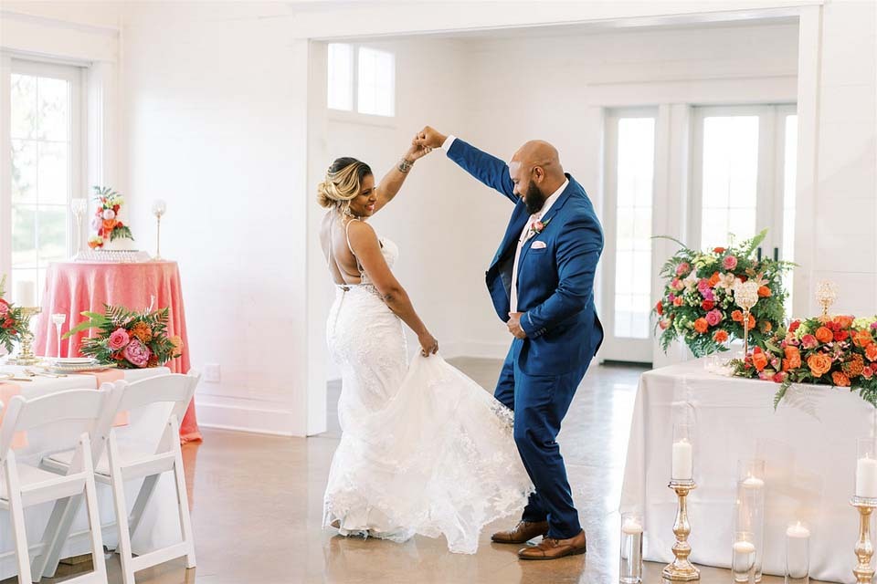 Wedding Budget Checklist | Newlyweds dancing at their microwedding reception