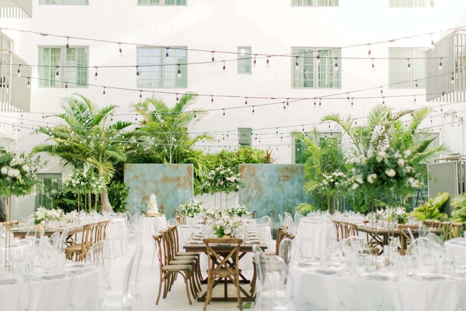 How To Create A Wedding Budget | A tropical outdoor wedding reception at The Betsy - South Beach