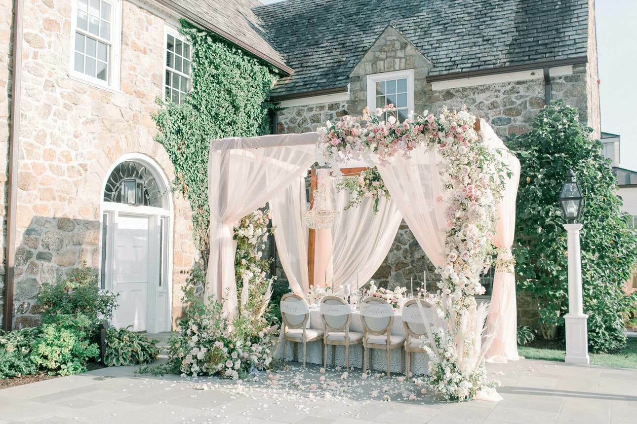 Wedding Checklist To-Do Timeline | Pink drapery over a romantic tablescape at Fiddler's Elbow Country Club in Bedminster Township, NJ