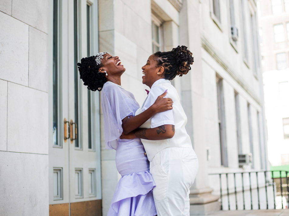 Wedding Day Timeline Example | Two adorable brides – with one in a purple dress!